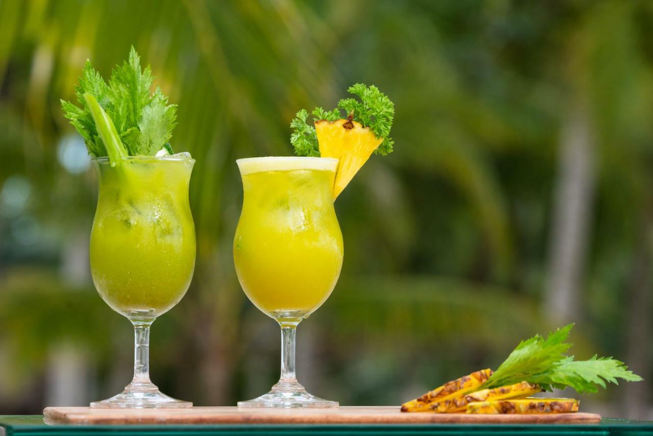 فندق ساوث بالمز ريزورت بانغلاو بنغلاو المظهر الخارجي الصورة Pineapple juice