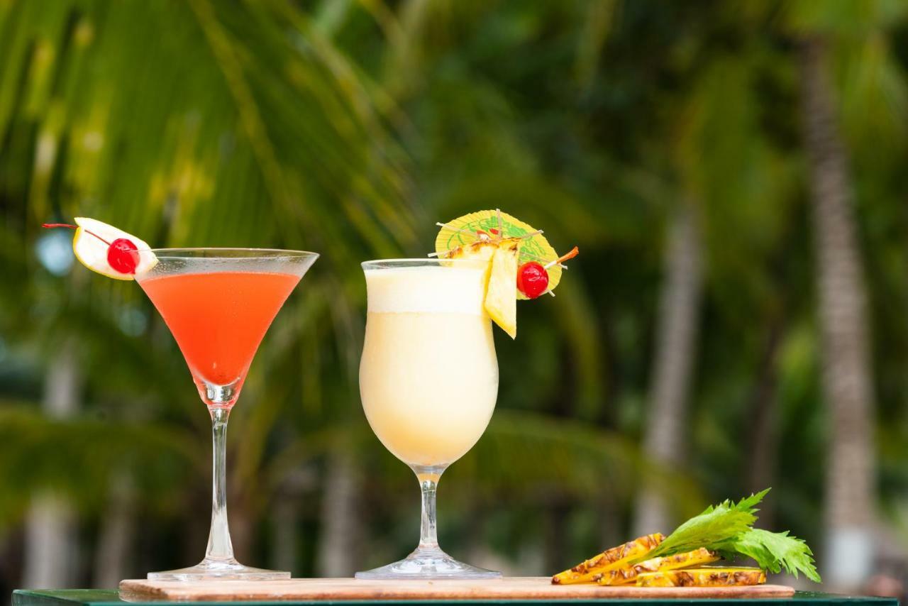 فندق ساوث بالمز ريزورت بانغلاو بنغلاو المظهر الخارجي الصورة Two tropical drinks