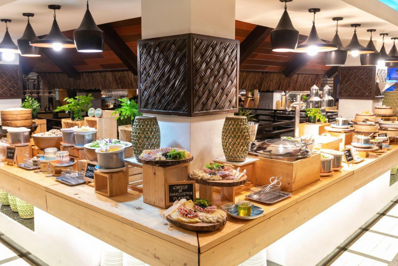 فندق ساوث بالمز ريزورت بانغلاو بنغلاو المظهر الخارجي الصورة A buffet at a hotel